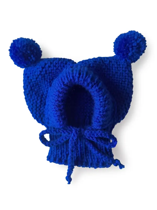 Blue knitted dog hood with two pom-poms