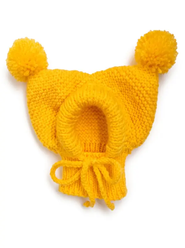 Yellow knitted dog hood with two pom-poms